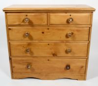 A pine chest of drawers, late 19th/early 20th century,