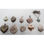 A collection of ten pendants of variable designs; most are lockets.