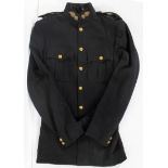 A First World War nurses uniform, comprising aprons and other linen,