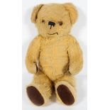 A Childsplay Toys, golden plush teddy bear with growler, fabric label,