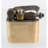 A Premier fluid lighter, of diminutive form, in a slip case marked 9th gold MT,