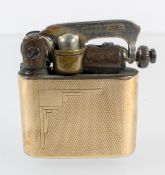 A Premier fluid lighter, of diminutive form, in a slip case marked 9th gold MT,