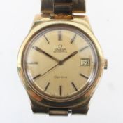 A gold plated Omega wristwatch.