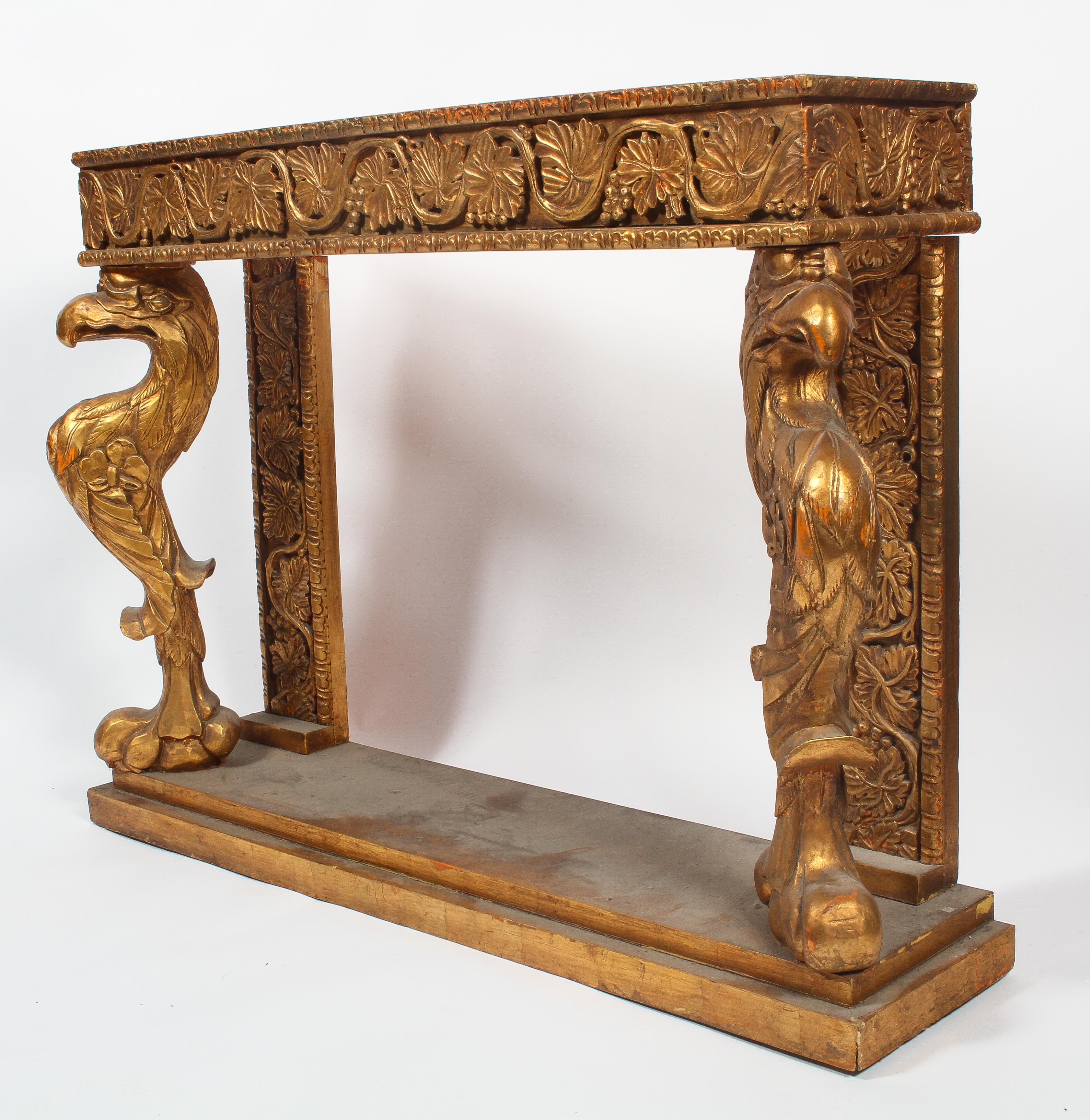 A gilt wood console table, in the manner of William Kent, with two eagle mono podae, - Image 2 of 2