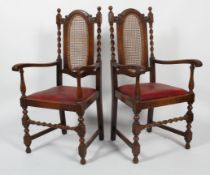 A pair of Victorian oak armchairs, in the 17th century style,