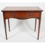 An early 19th century mahogany side table,