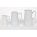 Three Copeland Spode 'New Stone' graduated jugs,