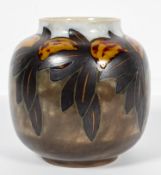 A Royal Doulton stoneware vase, of ovoid form, decorated with fruit and foliage to the shoulders,