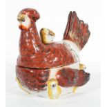 A French egg coddler, in the form of a hen and chicks,