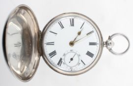 A full hunter pocket watch. Circular white dial with roman numerals.