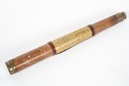 A brass and leather mounted single drawer telescope, the body engraved Cox, Devonport,