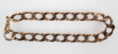 A yellow metal curb link bracelet with swivel and bolt clasp. Hallmarked 9ct gold, London (worn) 30.