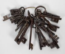 A large collection of antique keys, white metal and iron,