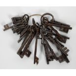 A large collection of antique keys, white metal and iron,