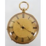 An open face pocket watch. Circular gold dial with roman numerals.