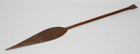 A 20th century carved hardwood ceremonial paddle, probably Micronesian,