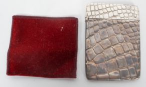 A silver embossed crocodile skin effect card case, Birmingham 1977,