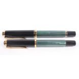 A Pelikan fountain pen, the two tone nib stamped 18C-750; and another smaller,