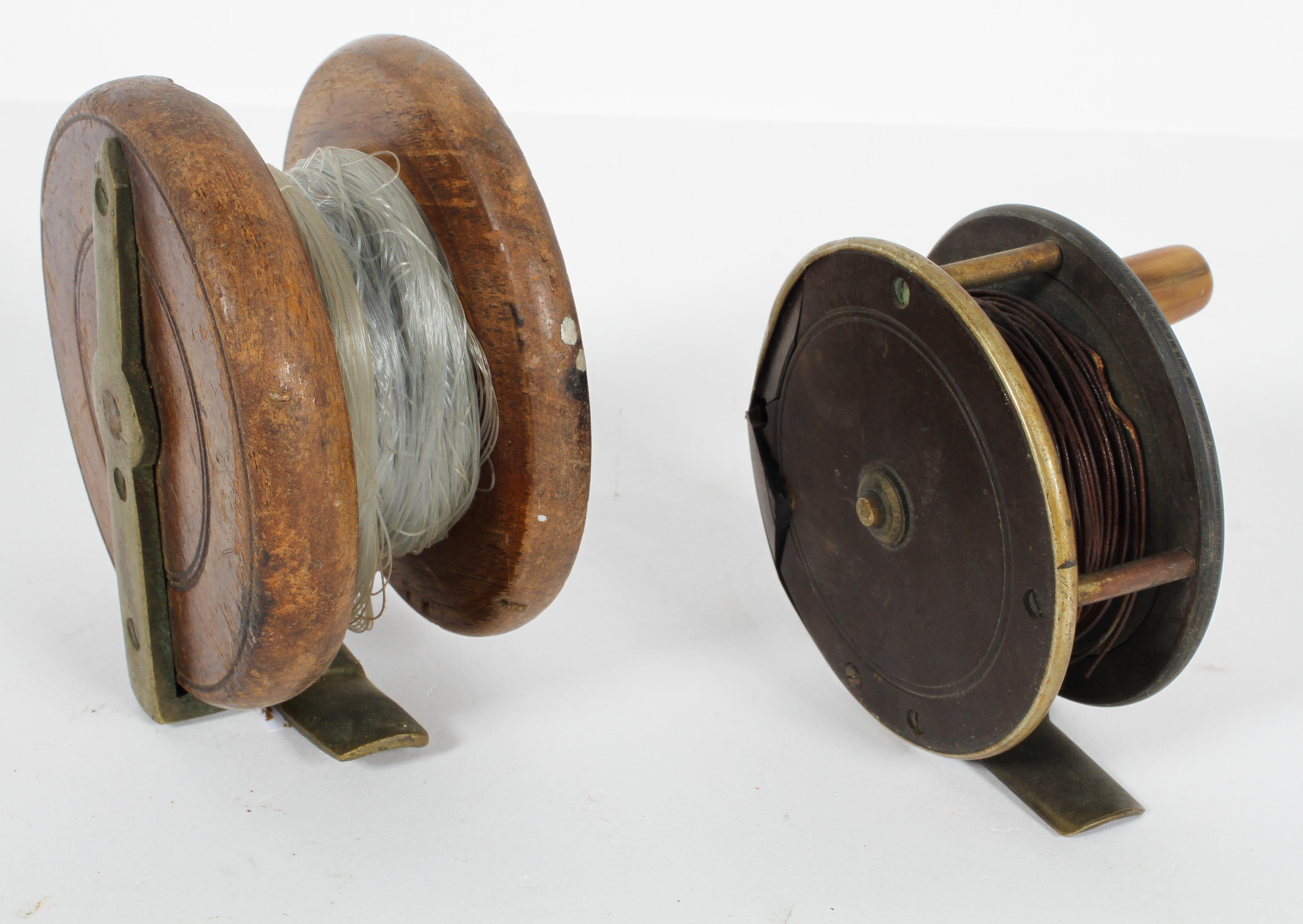 A 3 1/2" wooden fishing reel; a 3" bakelite reel and a cosh, - Image 2 of 2