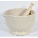A large ceramic cream glazed pestle and mortar, probably late 19th century,