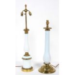 A gilt metal and milk glass lamp base, of baluster form, on a cylindrical base,