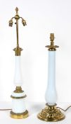 A gilt metal and milk glass lamp base, of baluster form, on a cylindrical base,