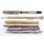 Two 'Mabie Todd & Co gold plated 'Swan' pens,
