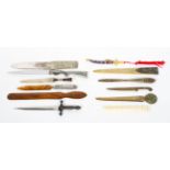 A collection of letter openers, to include Chinese enamelled, silver,