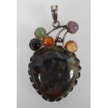 An abstract pendant set with agate (stones untested - visual inspection only).