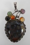 An abstract pendant set with agate (stones untested - visual inspection only).