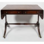 A Regency mahogany Pembroke table, early 19th century, with two frieze drawers within reeded edges,