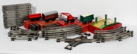 A collection of Hornby '0' gauge tin plate railway, including Passenger Break Van, Milk Traffic Van,