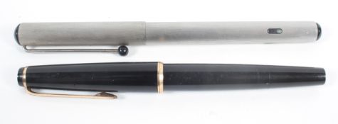 A Montblanc 'Turbo' fountain pen with a brushed steel case; and a Montblanc .