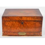 A 19th century mahogany stationery box, the sloped top enclosing a fitted interior,