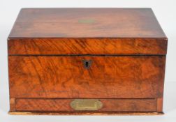 A 19th century mahogany stationery box, the sloped top enclosing a fitted interior,