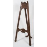 A large Victorian carved wood easel, late 19th century, A-framed,