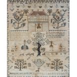 An early 19th century Sampler with alphabet, floral sprays,