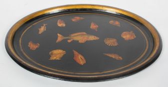 A 19th century Toleware oval tray, later decorated with decoupage work and shells,