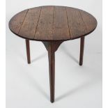 An 18th century oak breakfast table, of circular form,