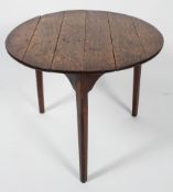 An 18th century oak breakfast table, of circular form,