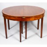 An early nineteenth century cross banded D-end demi-lune dining-table,