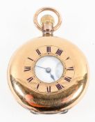 A yellow gold ladies hunter pocket watch. Circular white dial with roman numerals.