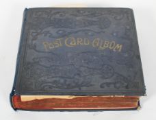 A large Edwardian postcard album, mounted with assorted images of artwork, sculpture,