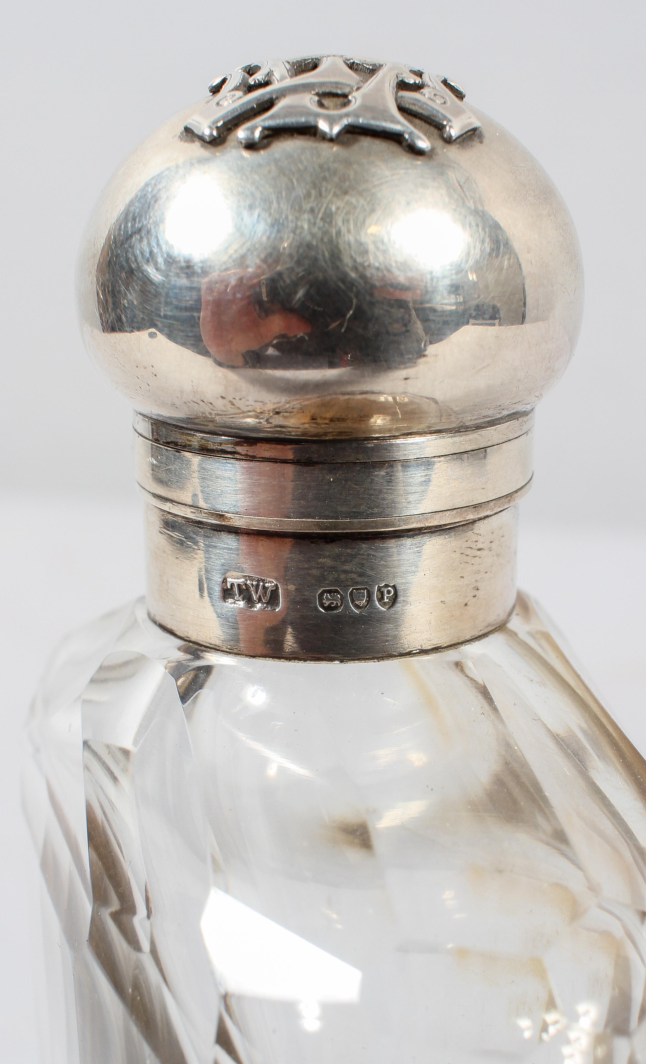 A panel cut glass hip flask with silver bayonet catch, silver top and pull off stirrup cup, - Image 2 of 2