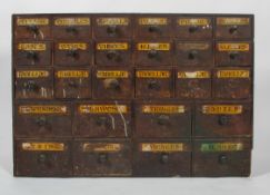 A stained pine apothecary's chest, late 19th/early 20th century, of rectangular section,