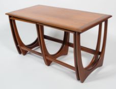 A G-plan 'Astro' teak table, of rectangular section and two smaller occasional tables, mid-century,