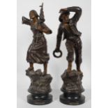 A pair of late 19th century French patinated Spelter figures of fisher folk,