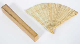 A late 19th century Chinese carved ivory brise fan,