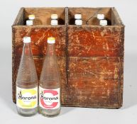 A vintage 20th century wooden crate with bottles