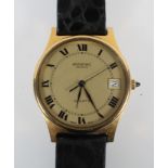 A gold plated Raymond Weil wristwatch. Circular gold dial with roman numerals and date feature.